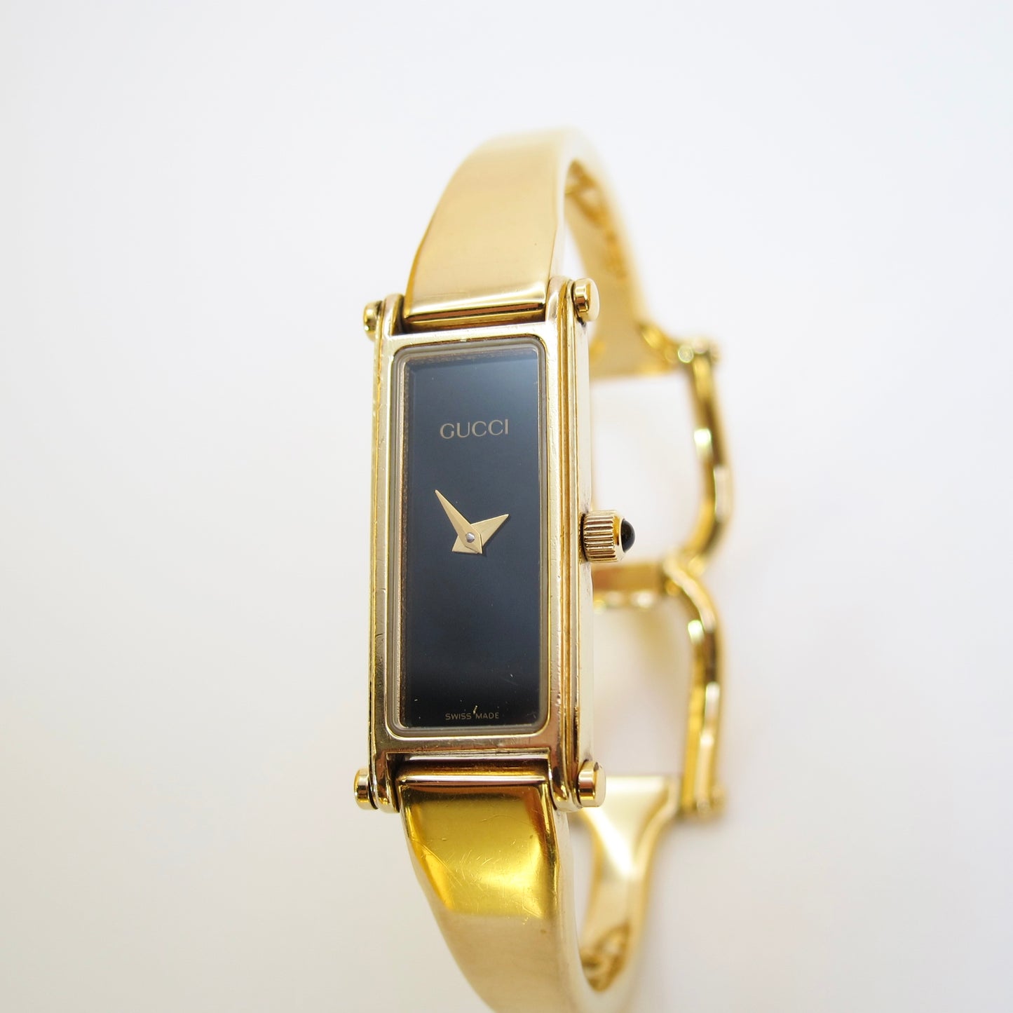 Gucci Vintage Rectangle Black Face Golden Bangle Watch