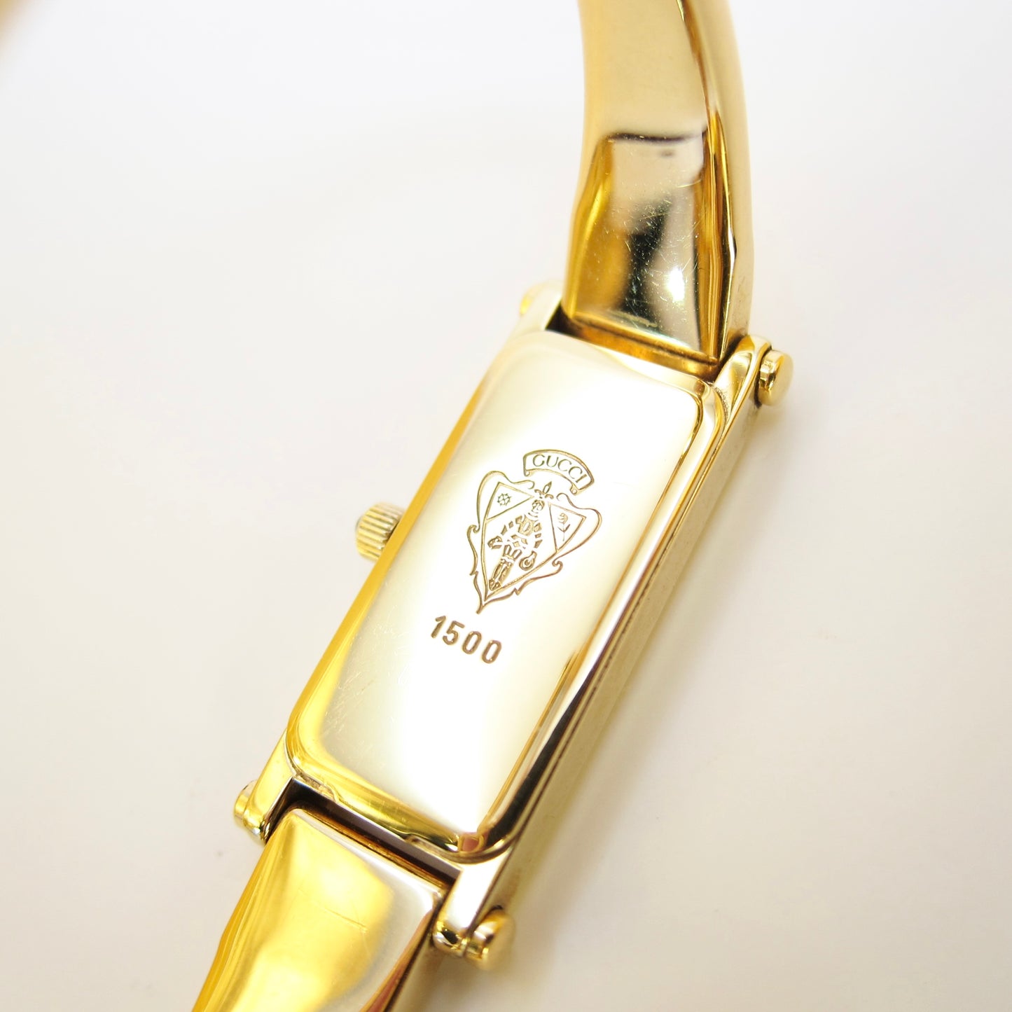 Gucci Vintage Rectangle Black Face Golden Bangle Watch