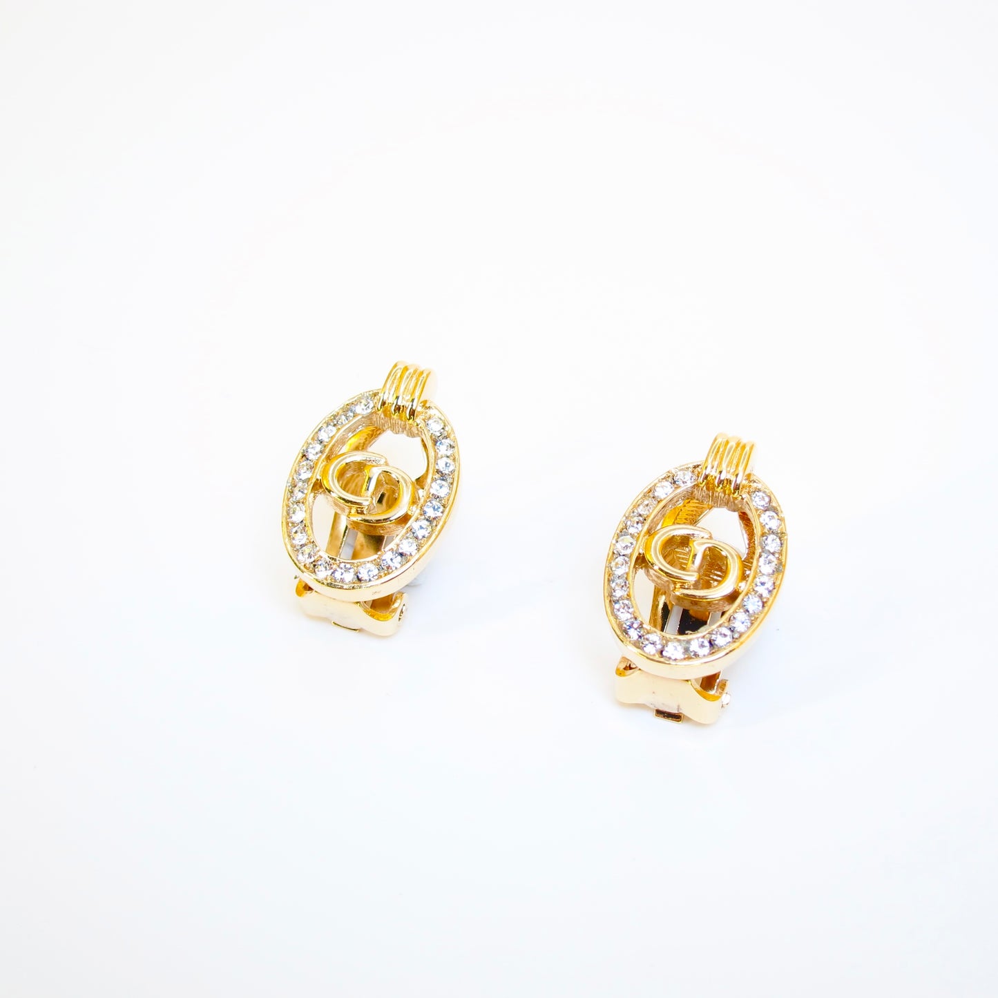 Christian Dior Vintage CD Logo in Oval Shape with Rhinestone Golden Clip-on Earrings