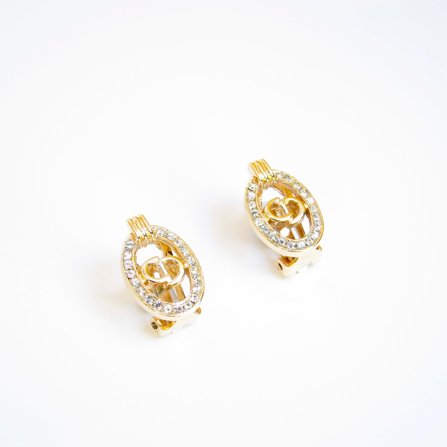 Christian Dior Vintage CD Logo in Oval Shape with Rhinestone Golden Clip-on Earrings