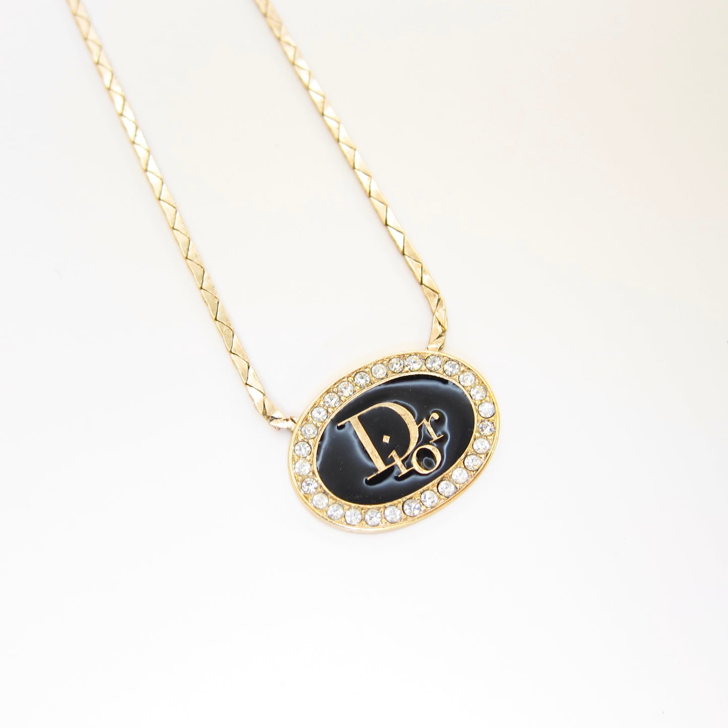 Christian Dior Vintage Dior Logo on Oval Shape Black and Rhinestone Golden Necklace