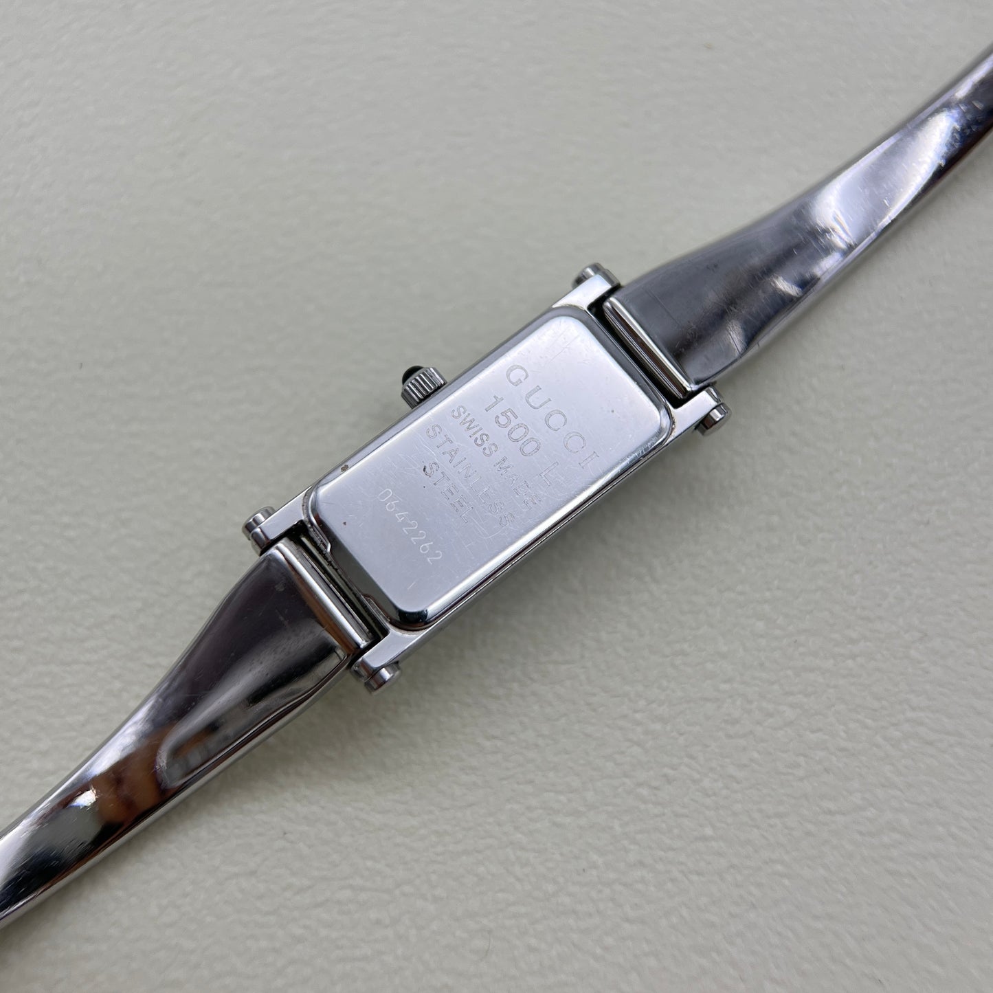 Gucci Vintage Rectangle Black Face Silver Bangle Watch