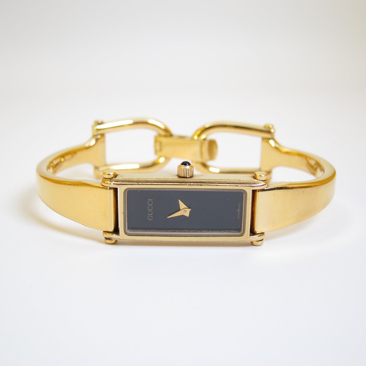 Gucci Vintage Rectangle Black Face Golden Bangle Watch