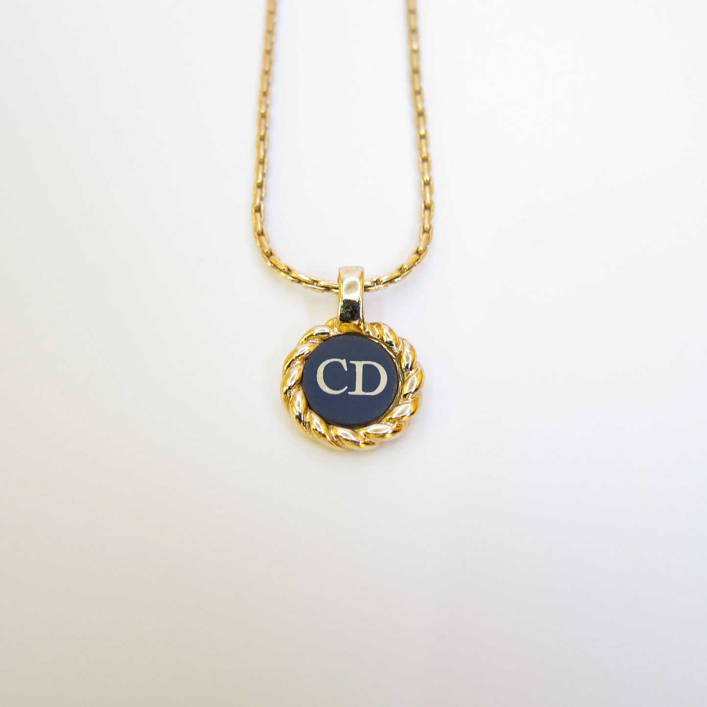 Christian Dior Vintage CD Logo in Black Circle and Twist Golden Necklace