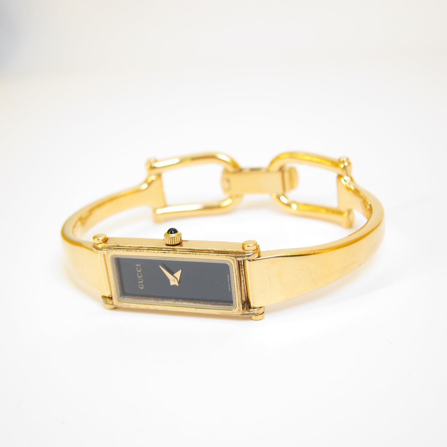 Gucci Vintage Rectangle Black Face Golden Bangle Watch