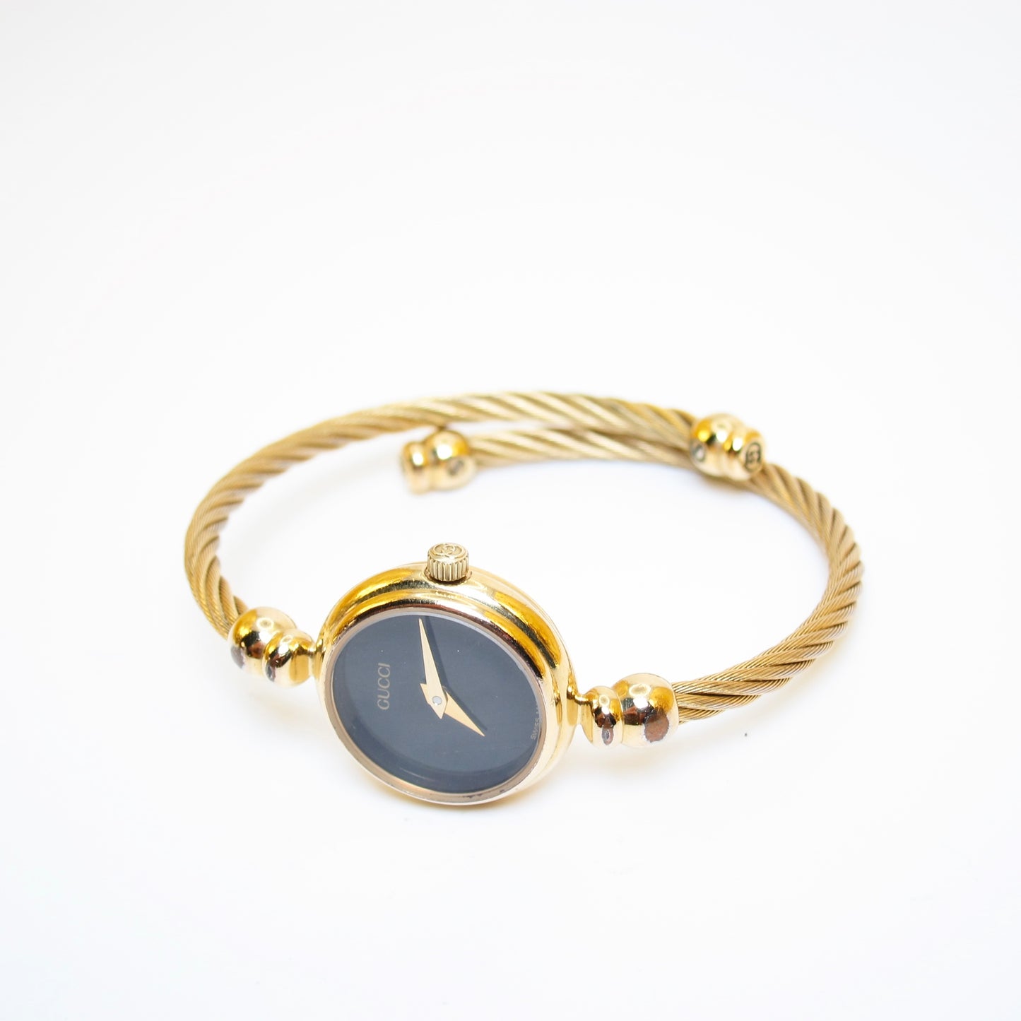 Gucci Vintage Round Black Face Golden Bangle Watch