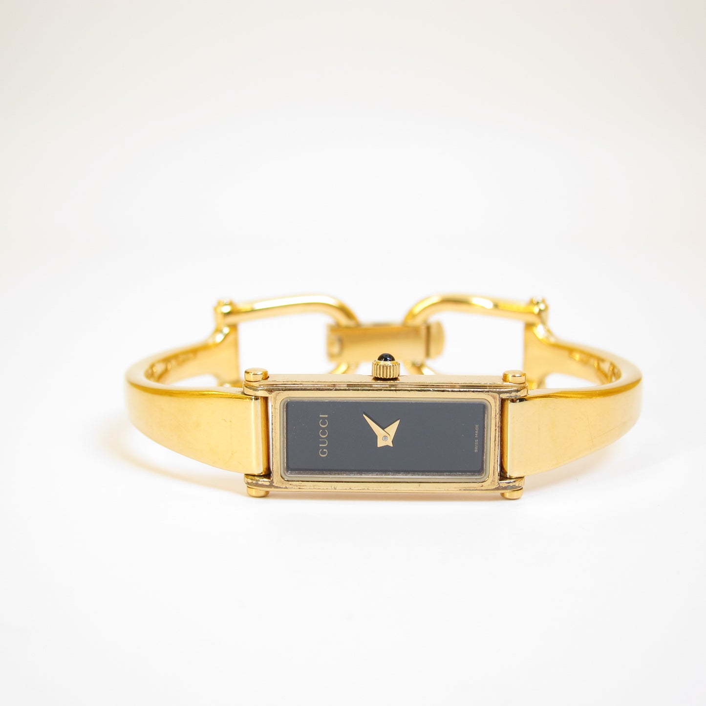 Gucci Vintage Rectangle Black Face Golden Bangle Watch