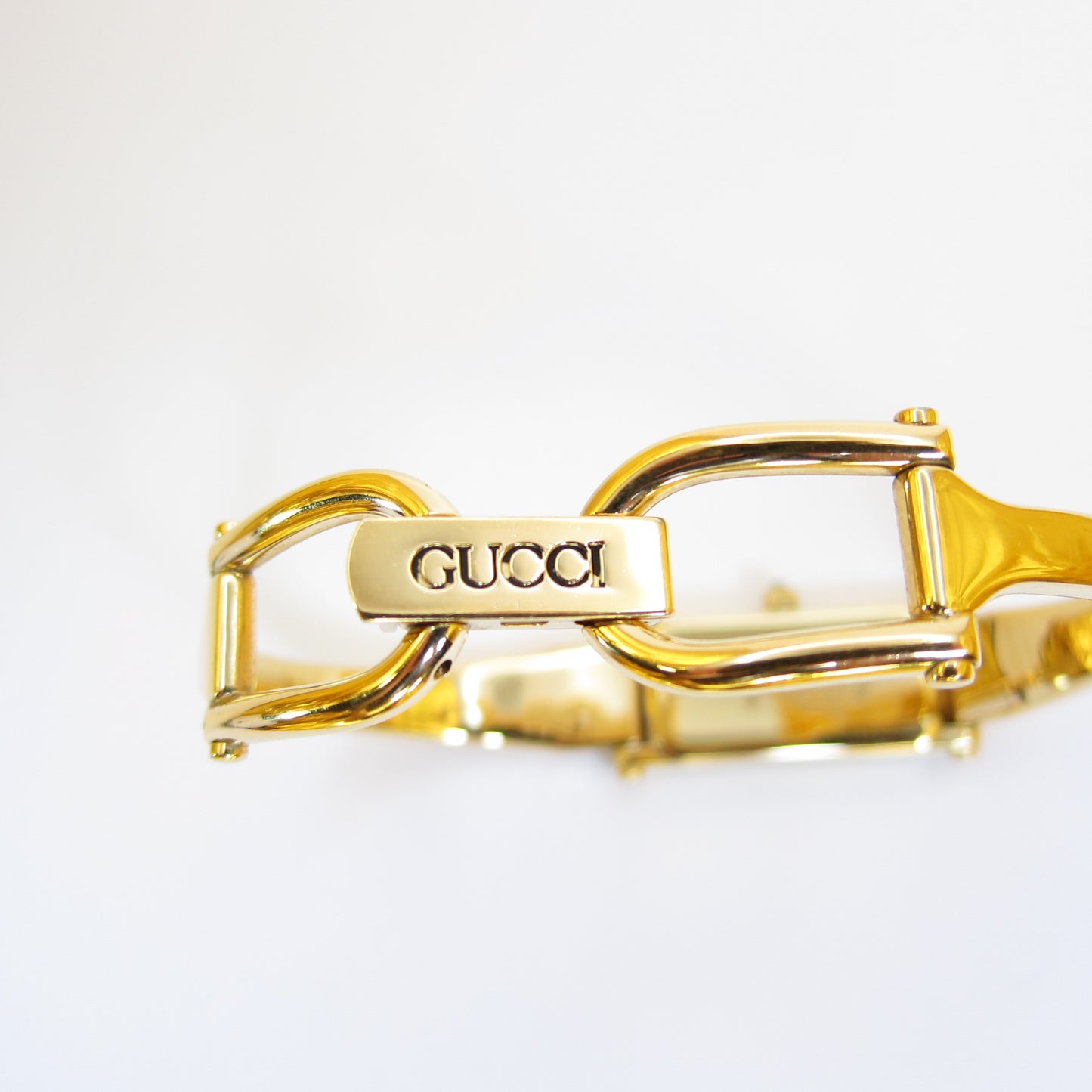 Gucci Vintage Rectangle Black Face Golden Bangle Watch