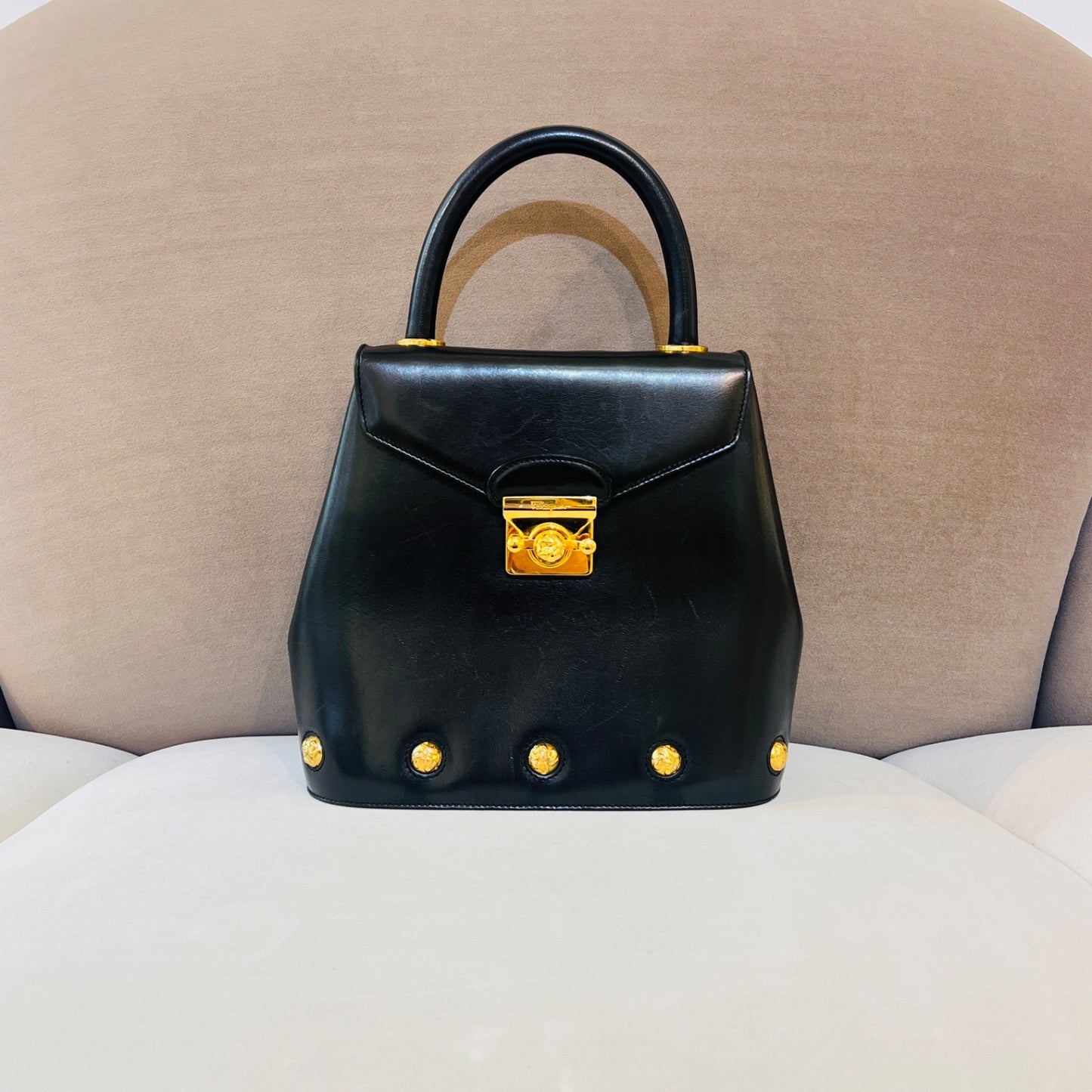Ferragamo Vintage Black Leather 2-Way Handbag With Gold Medallions