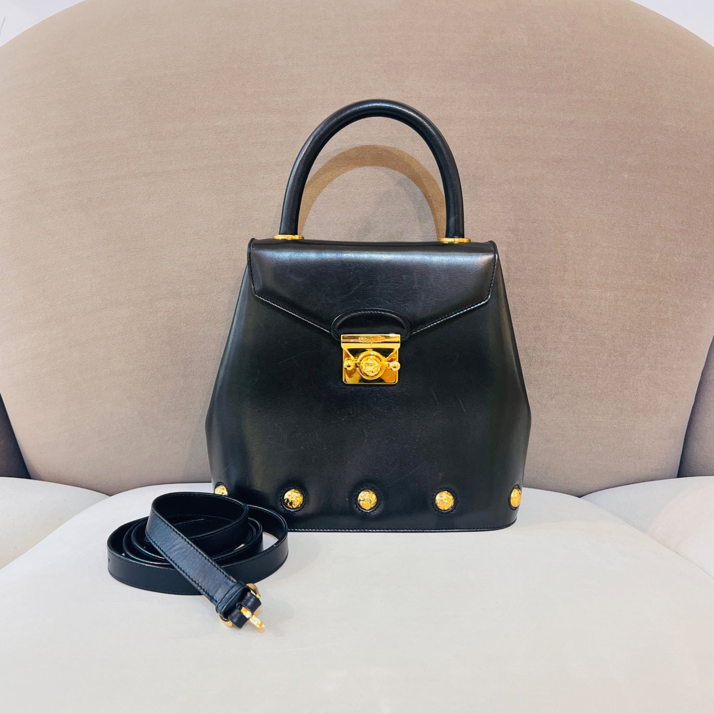 Ferragamo Vintage Black Leather 2-Way Handbag With Gold Medallions