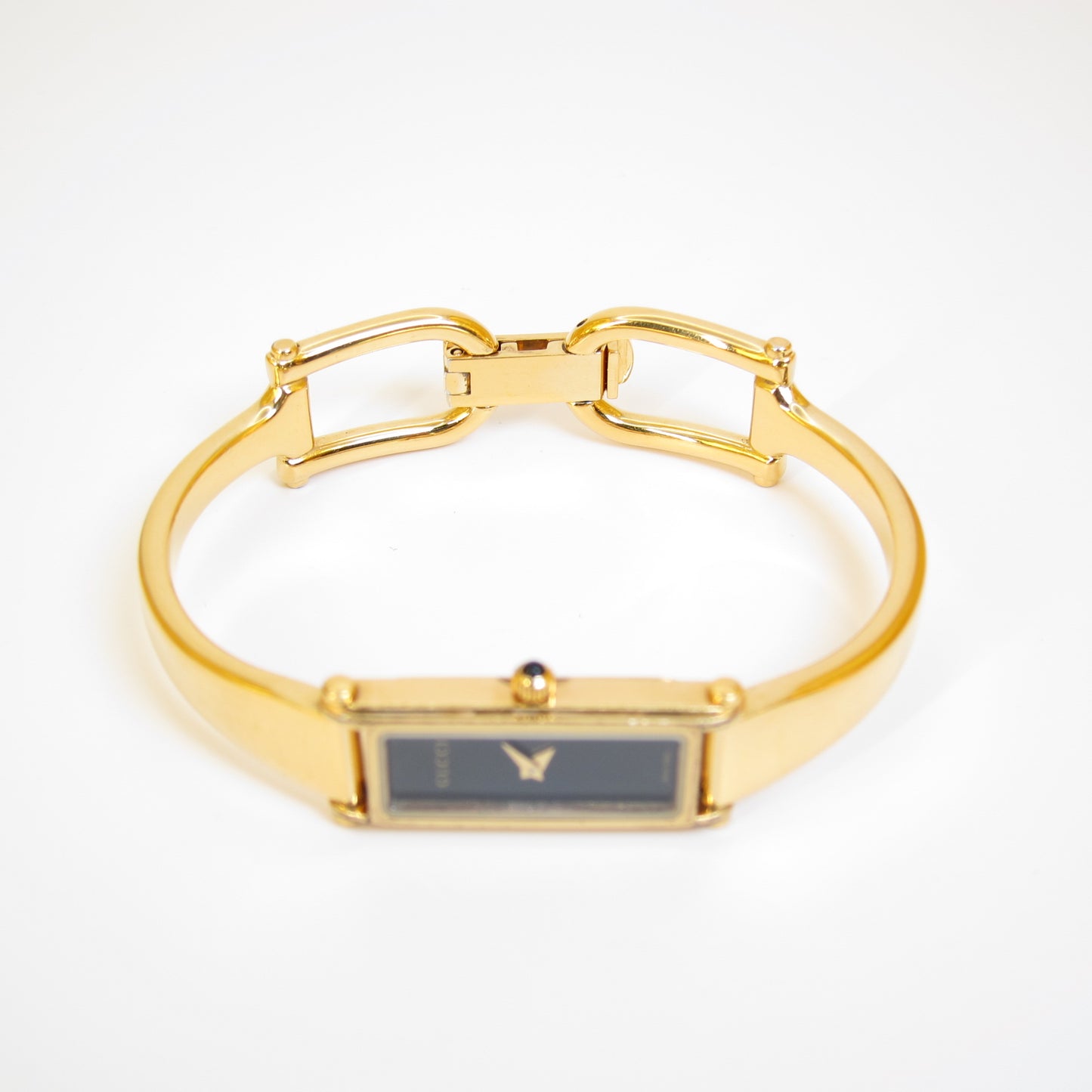 Gucci Vintage Rectangle Black Face Golden Bangle Watch