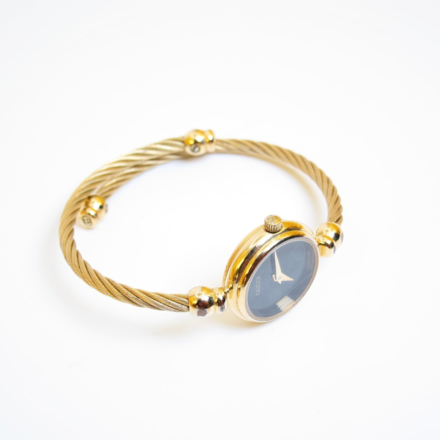 Gucci Vintage Round Black Face Golden Bangle Watch