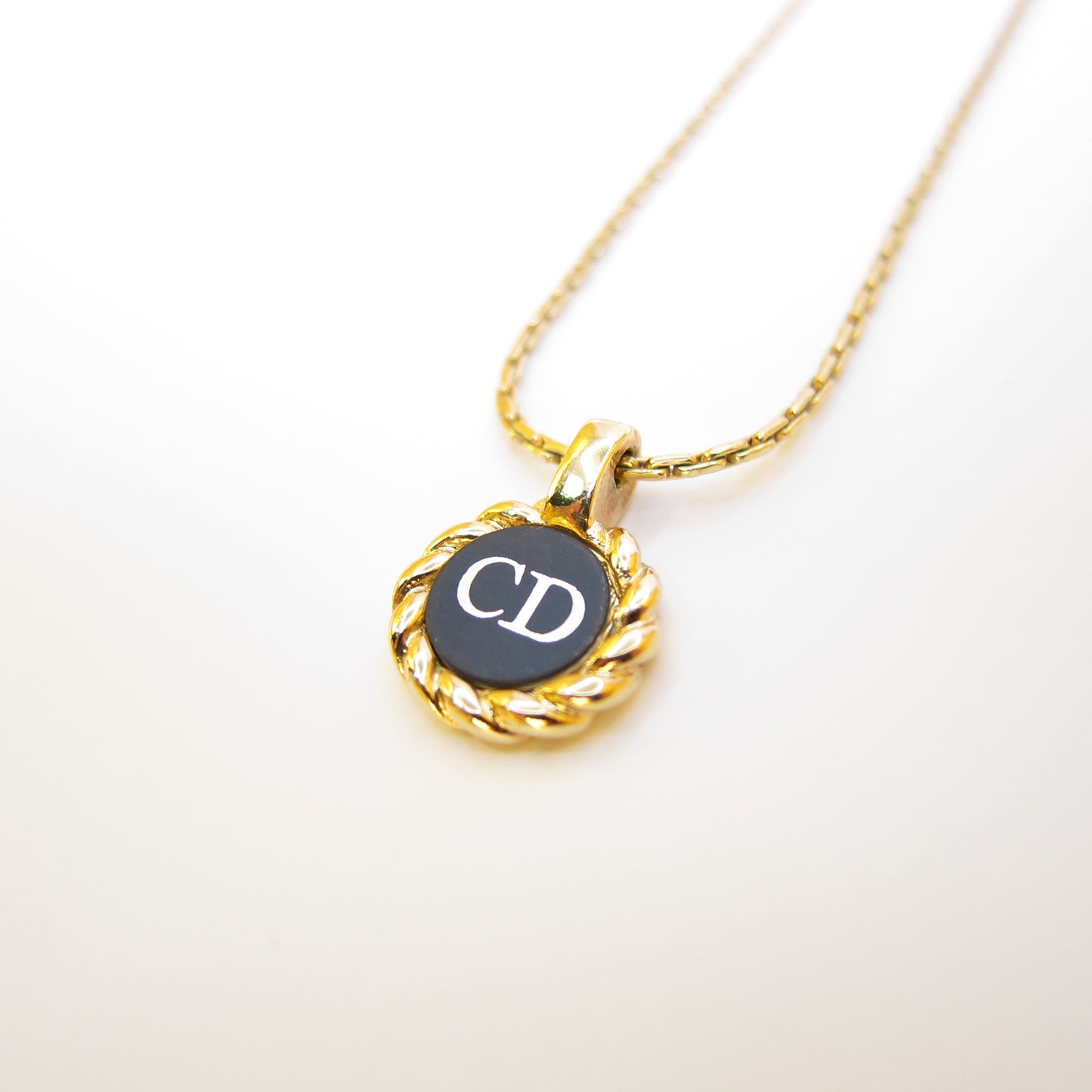 Christian Dior Vintage CD Logo in Black Circle and Twist Golden Necklace