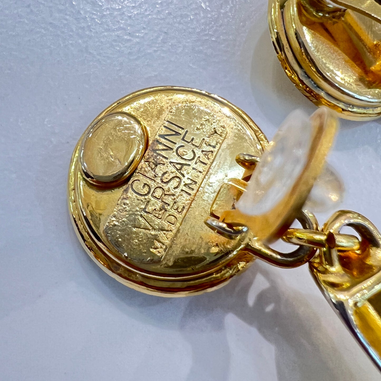 Versace Vintage Golden Medusa With Cross Dangling Clip-On Earrings