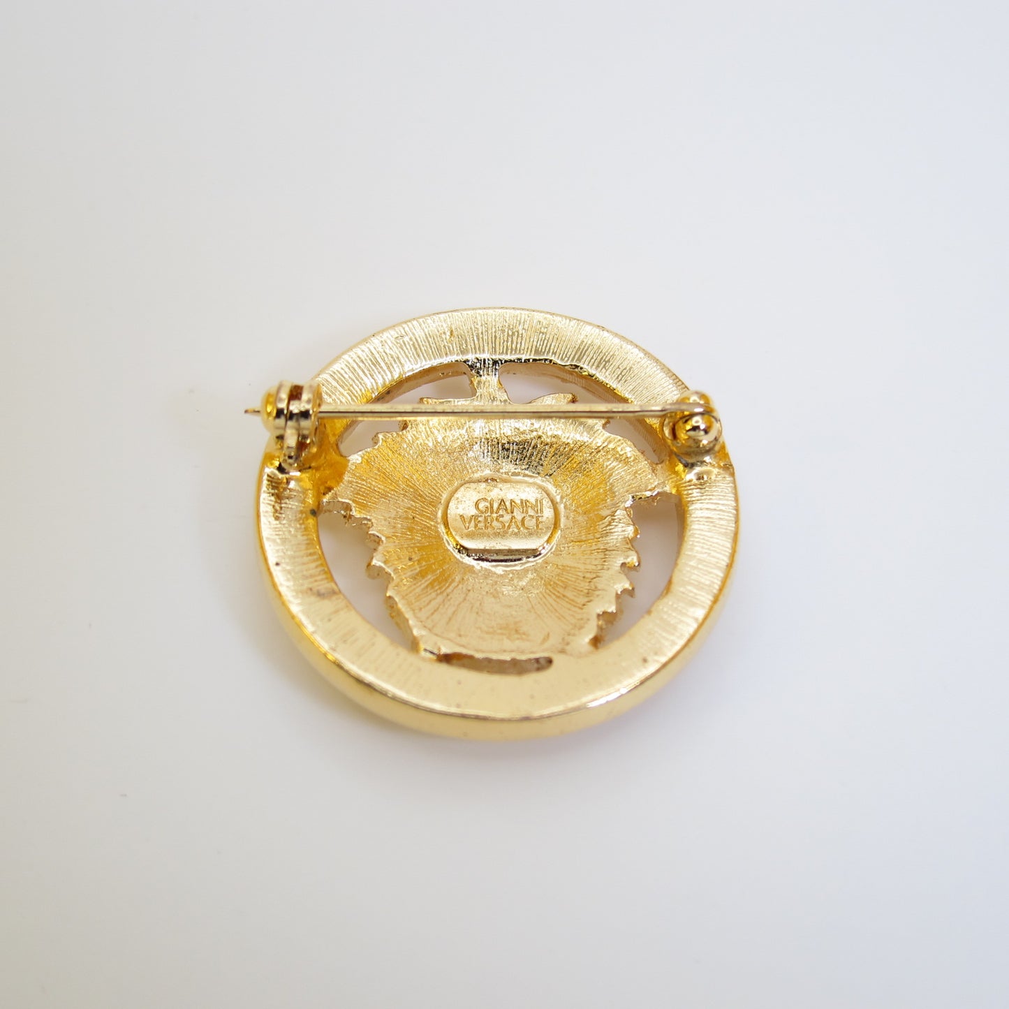 Gianni Versace Vintage Medusa Icon with Rhinestone Golden Brooch