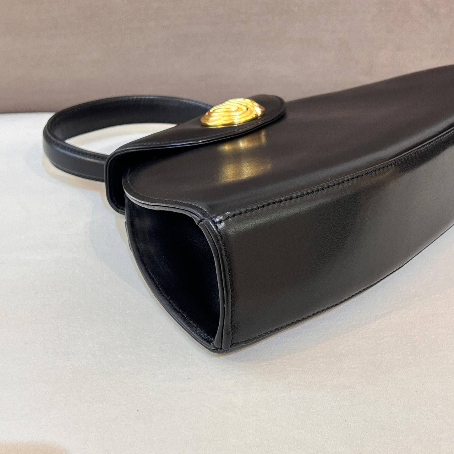 Givenchy Vintage Black Leather Trapezoid Top Handle Bag With Gold Medallion Clasp