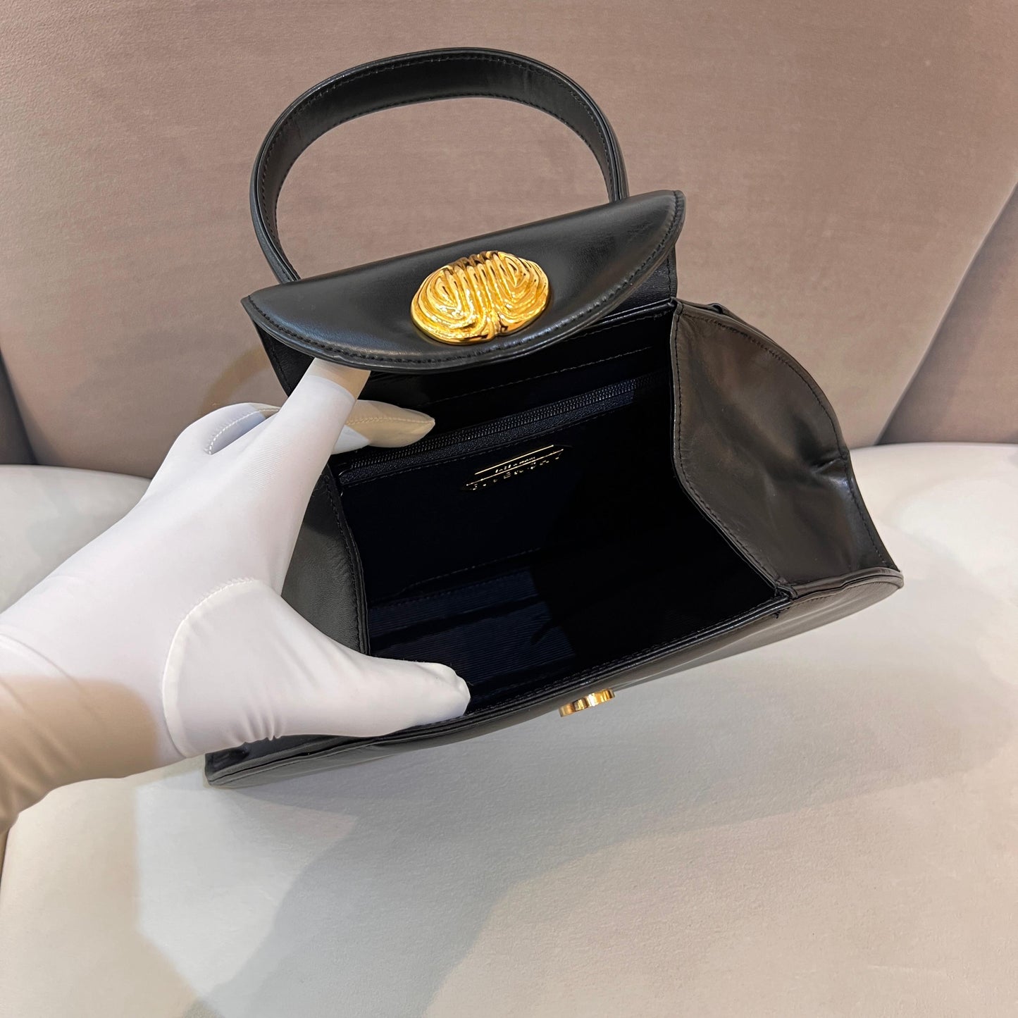 Givenchy Vintage Black Leather Trapezoid Top Handle Bag With Gold Medallion Clasp