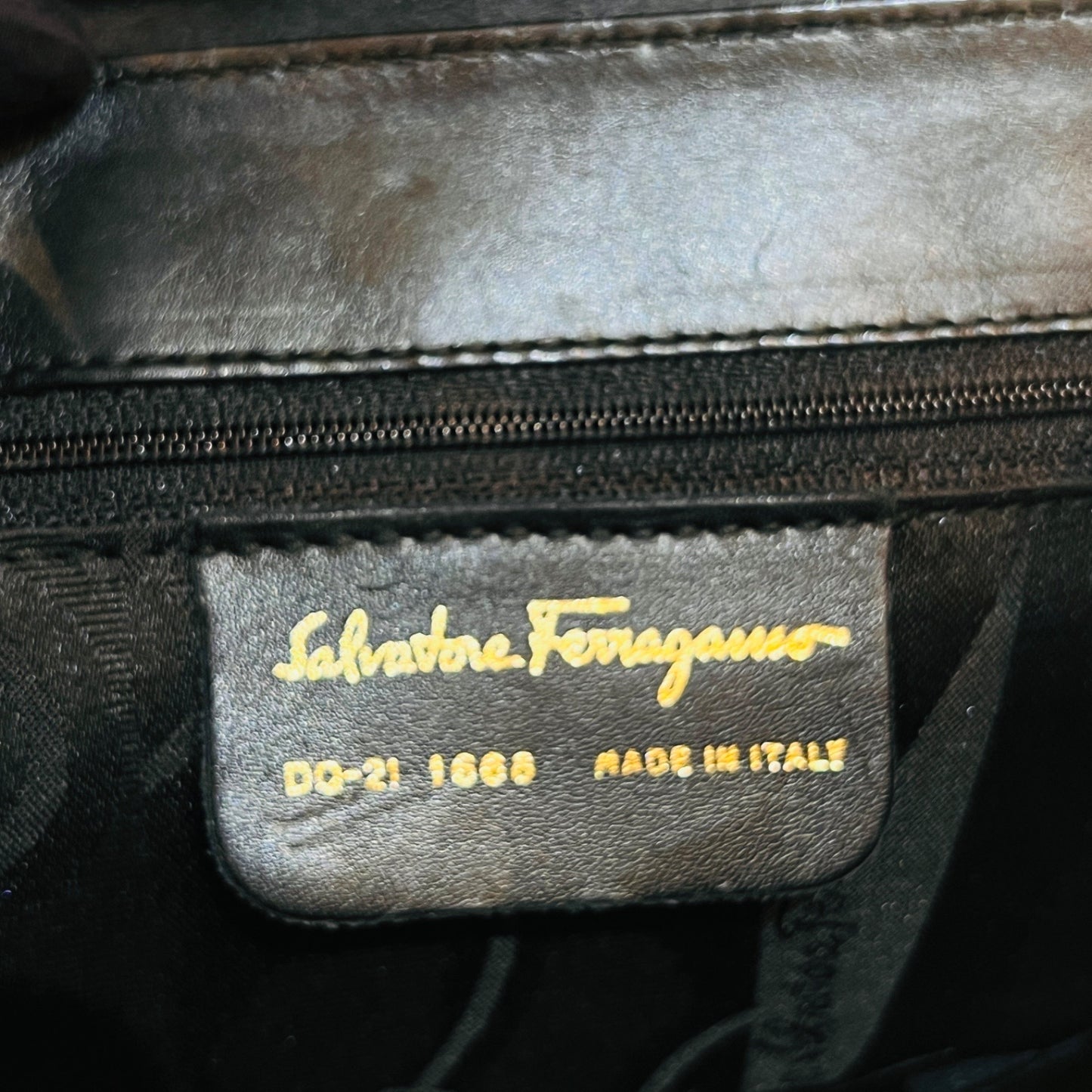 Ferragamo Vintage Black Leather 2-Way Handbag With Gold Medallions