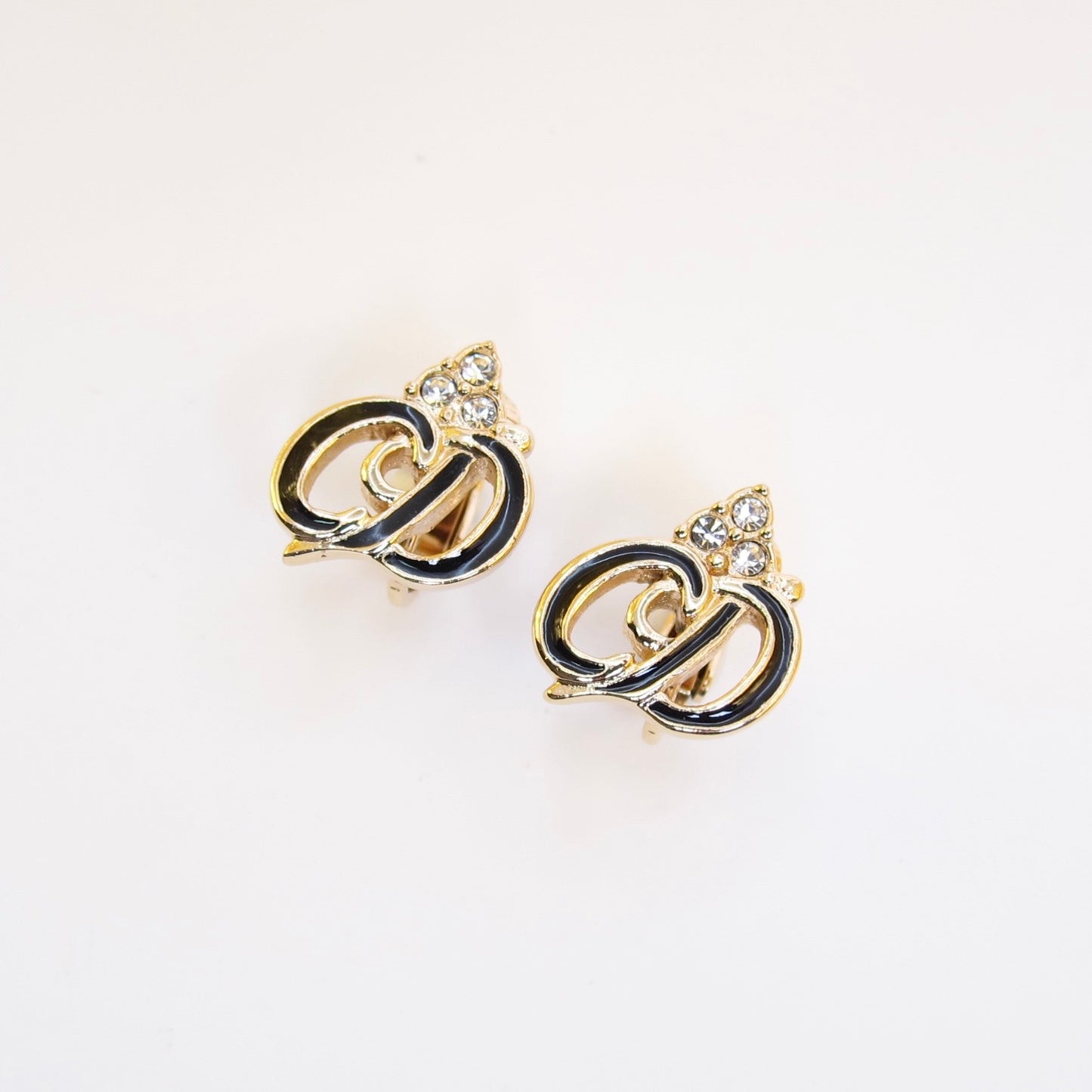 Christian Dior Vintage CD Logo Black and Rhinestone Golden Clip-on Earrings