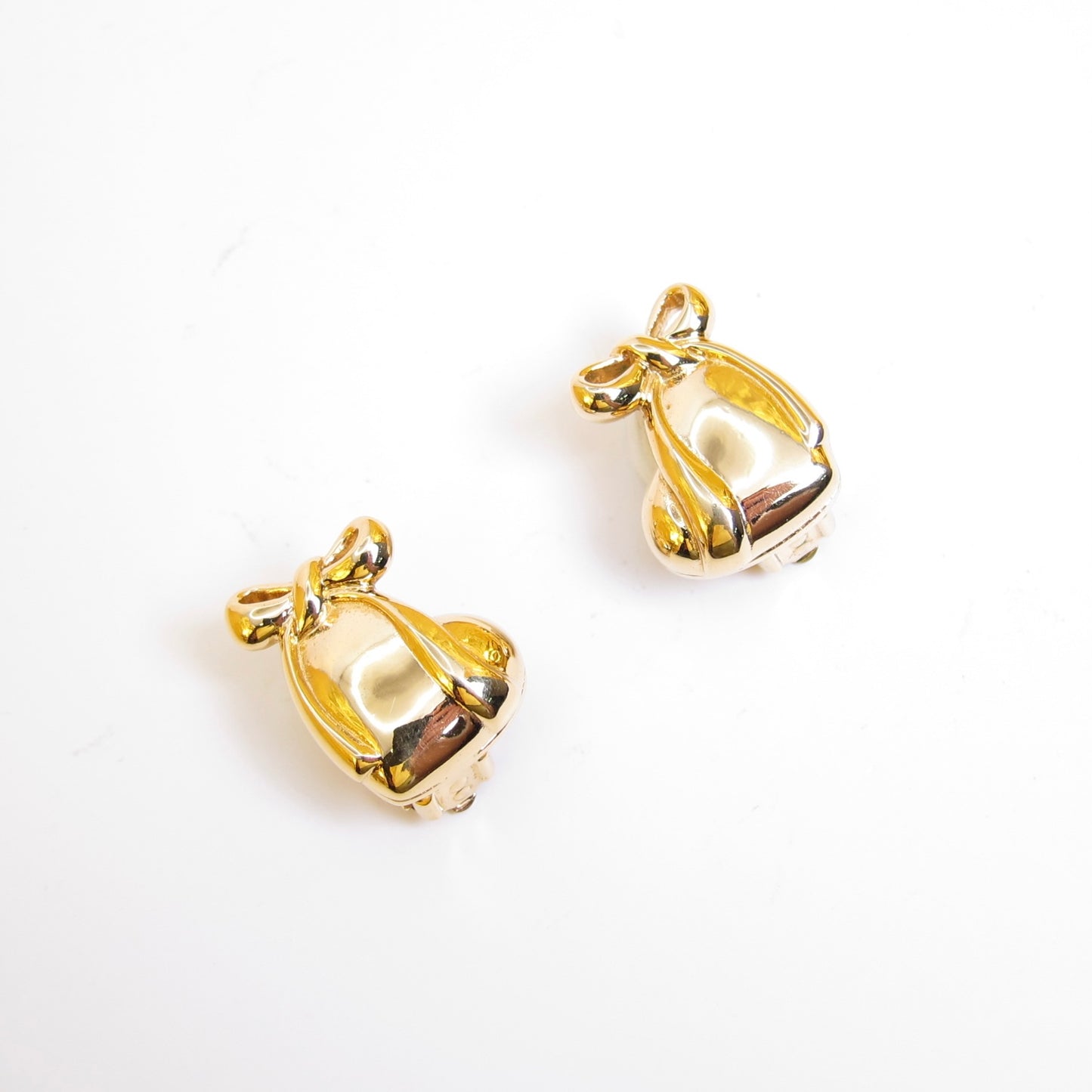 Nina Ricci 絲帶金色夾式耳環