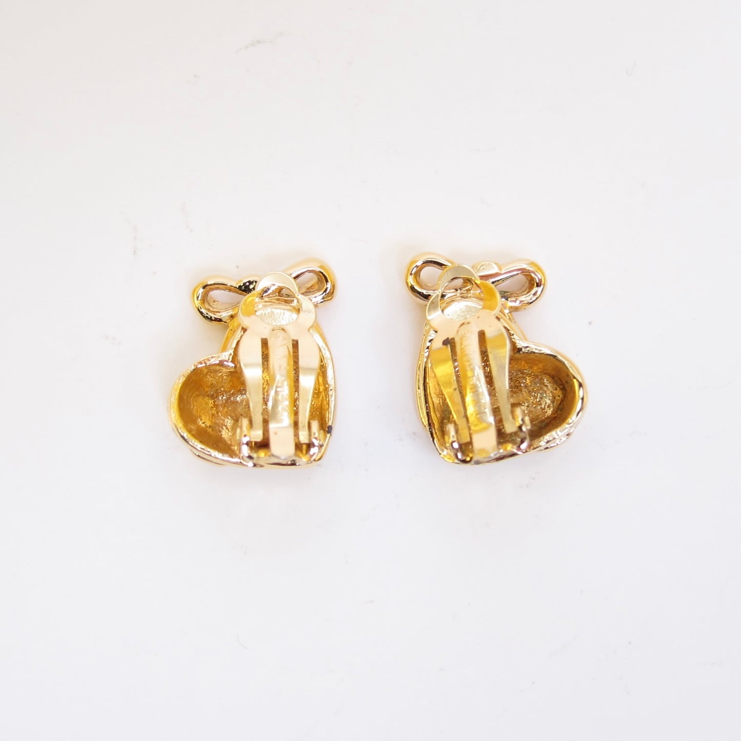 Nina Ricci 絲帶金色夾式耳環