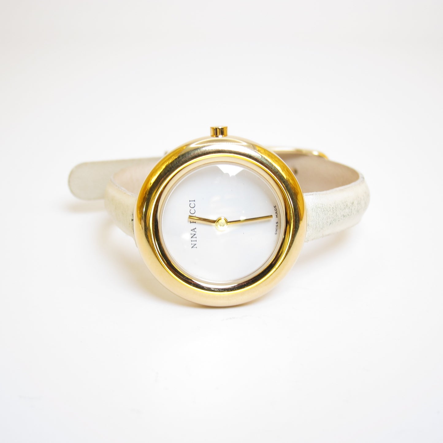 Nina Ricci Vintage Round White Face Golden Watch with Ivory Leather Strap