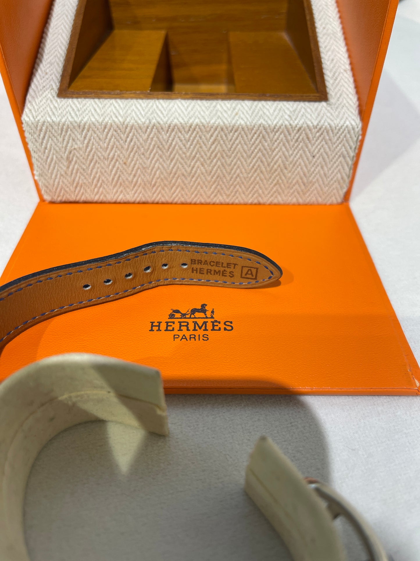 Hermes Vintage Blue Face Stainless Steel H Watch With Blue Leather Strap
Product Of 1997
With Original Box