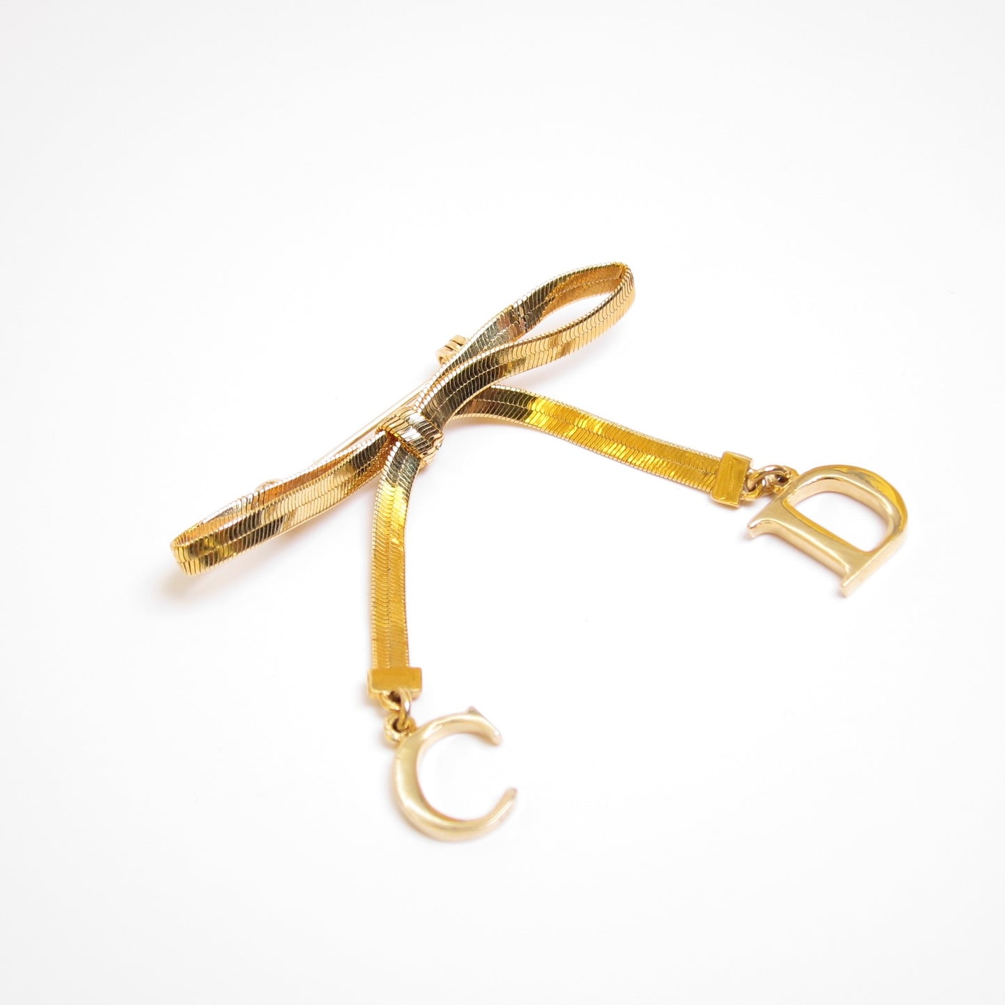 Christian Dior Vintage CD Logo Ribbon Golden Brooch