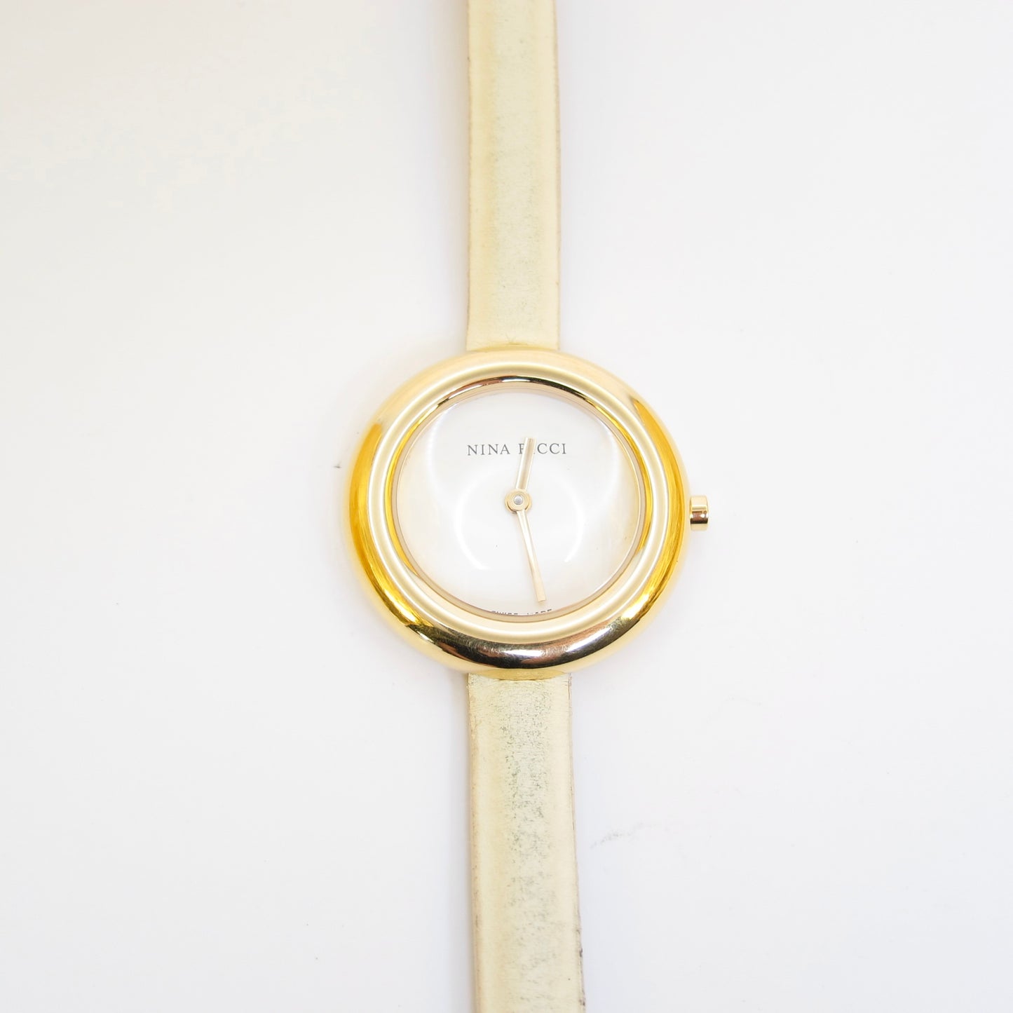 Nina Ricci Vintage Round White Face Golden Watch with Ivory Leather Strap