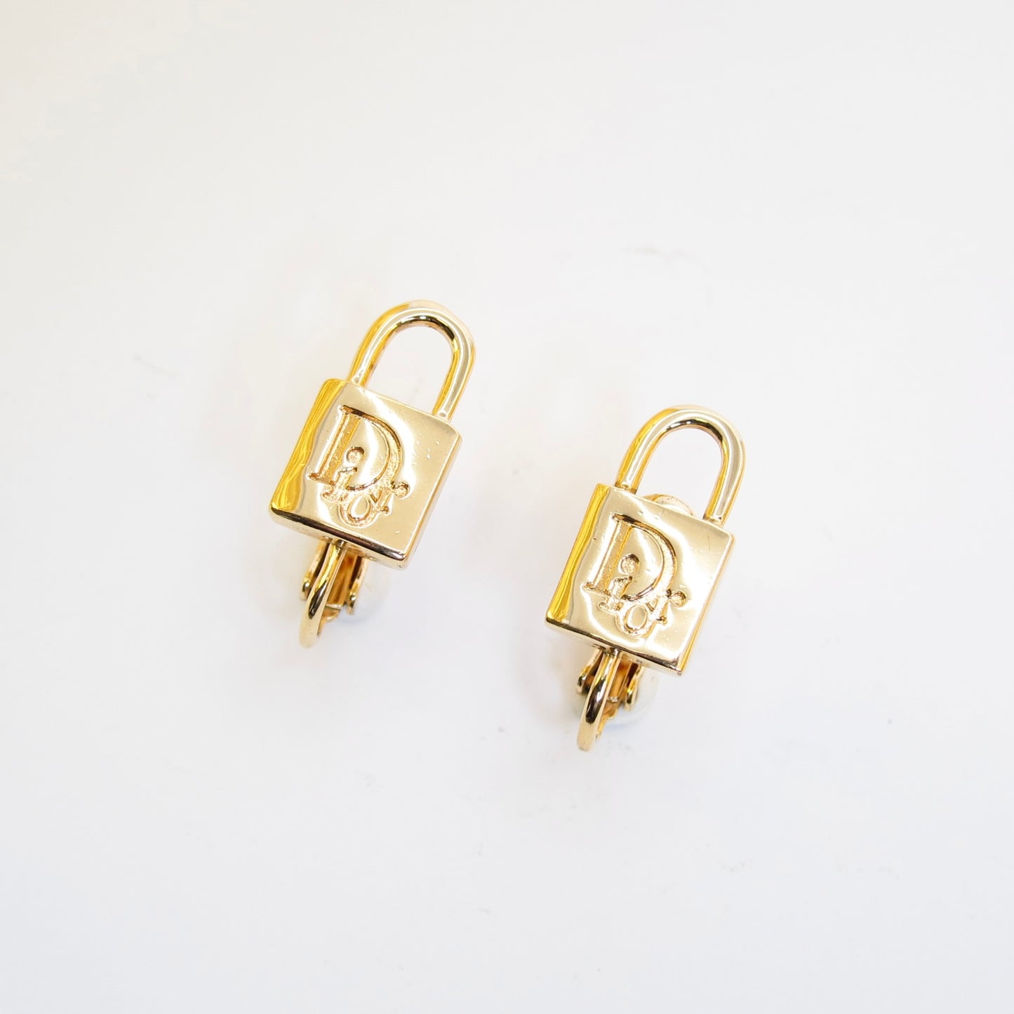 Christian Dior Vintage Dior Logo on Padlock Golden Clip-on Earrings