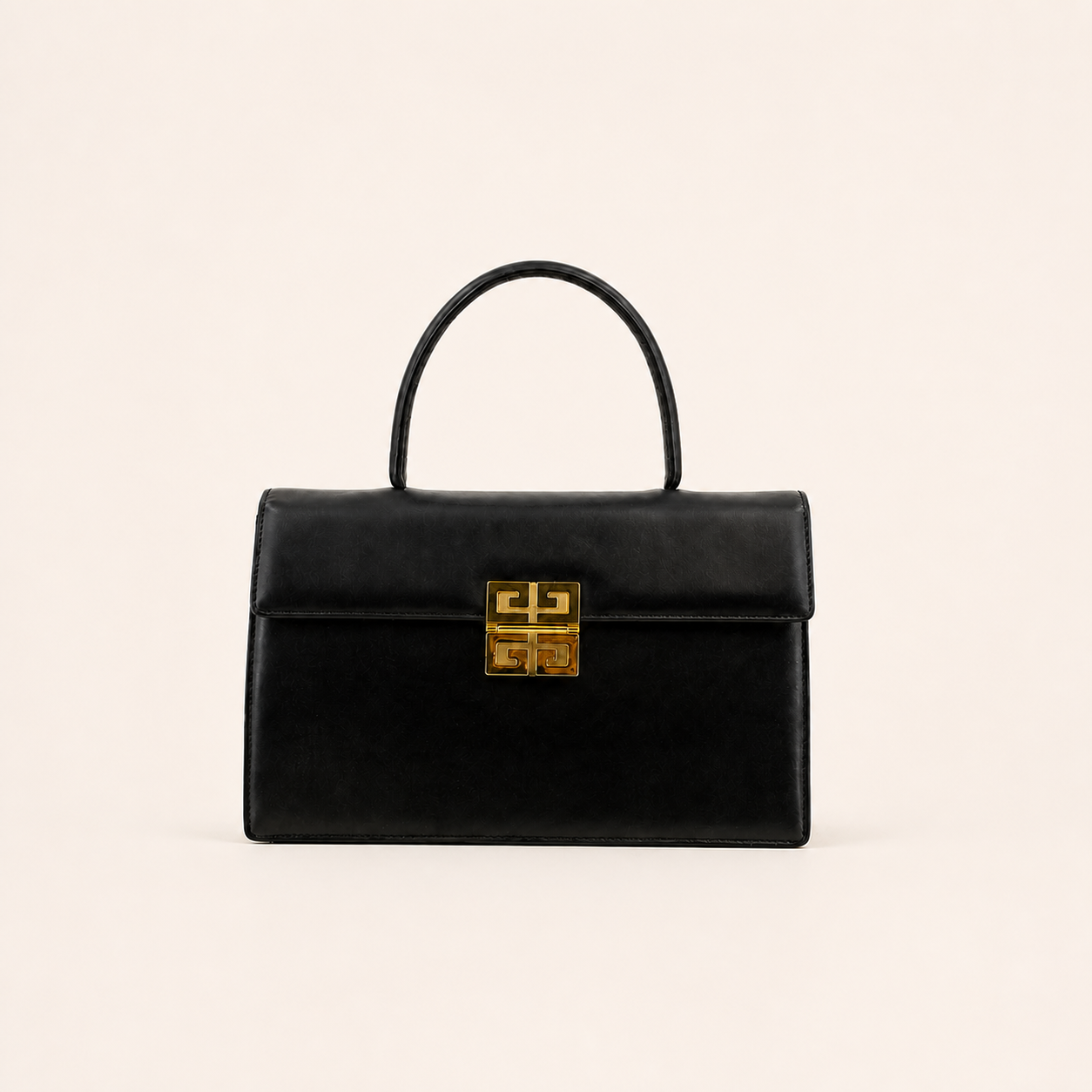 Vintage Givenchy black leather top handle handbag with gold 4G clasp