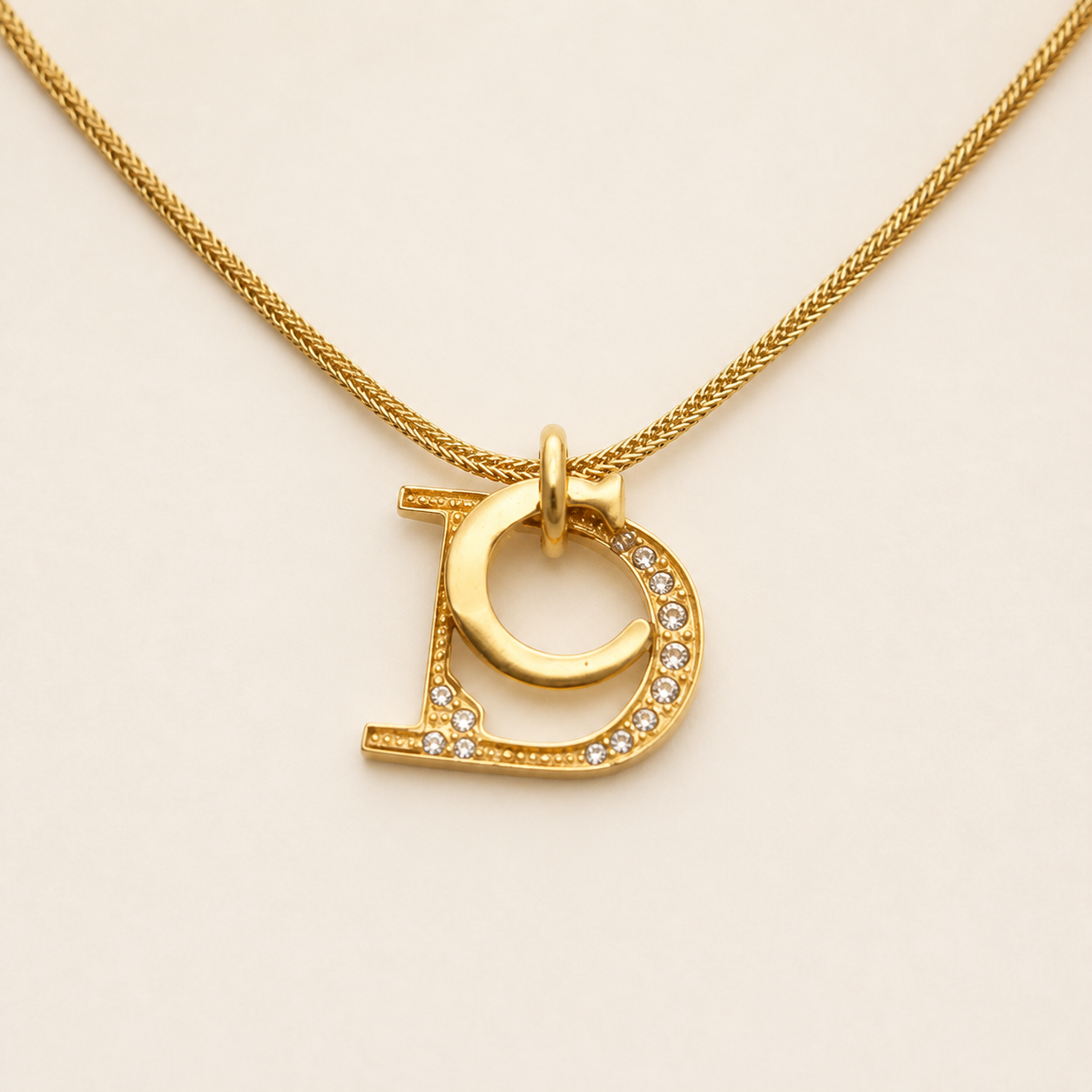 Christian Dior vintage gold-tone crystal D logo pendant necklace