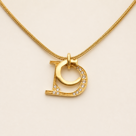 Christian Dior vintage gold-tone crystal D logo pendant necklace