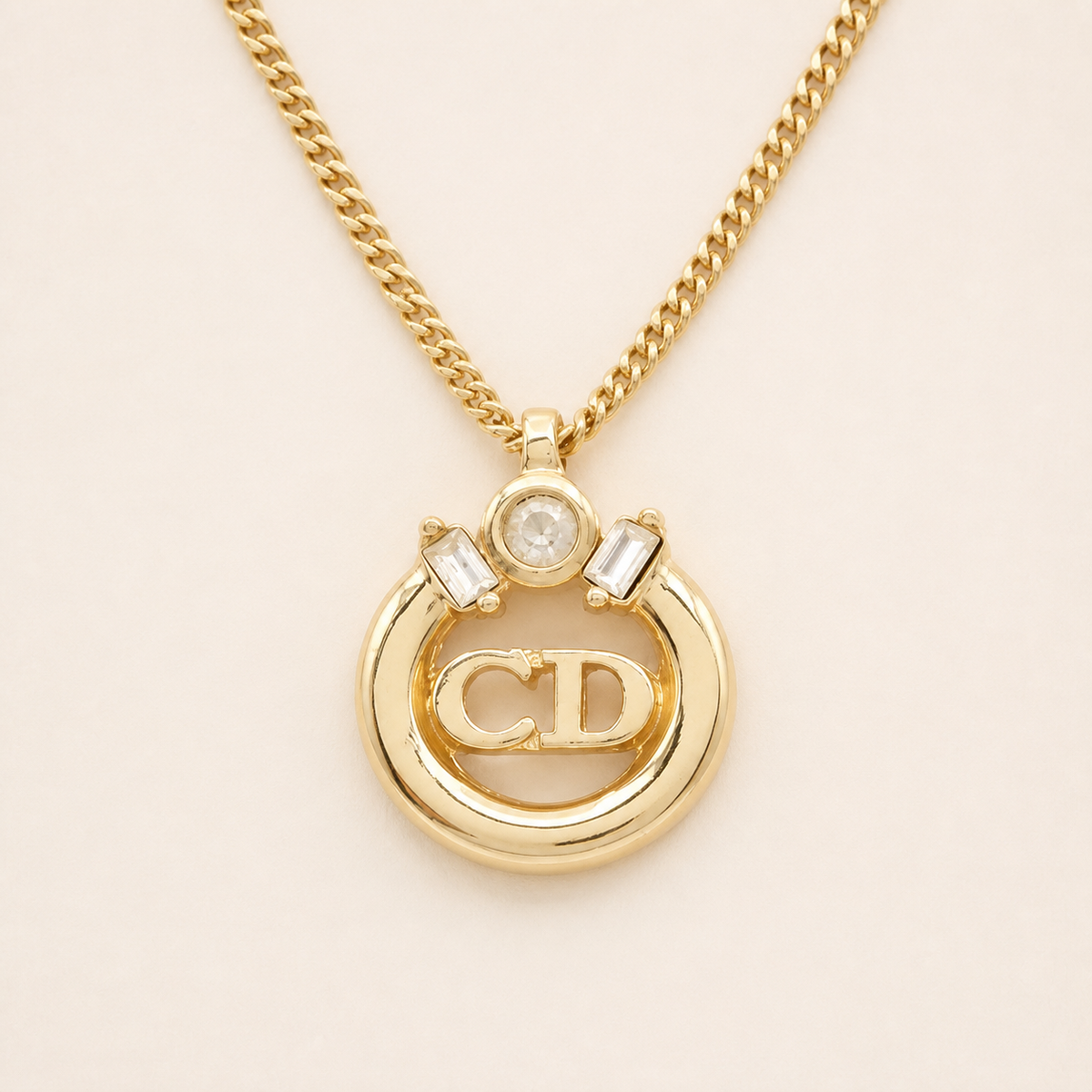 Christian Dior vintage gold-tone circular CD logo crystal necklace