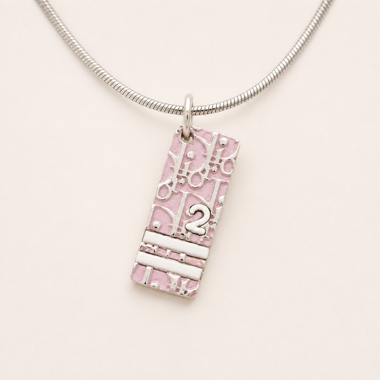 Christian Dior pink Trotter pendant necklace on silver-tone chain