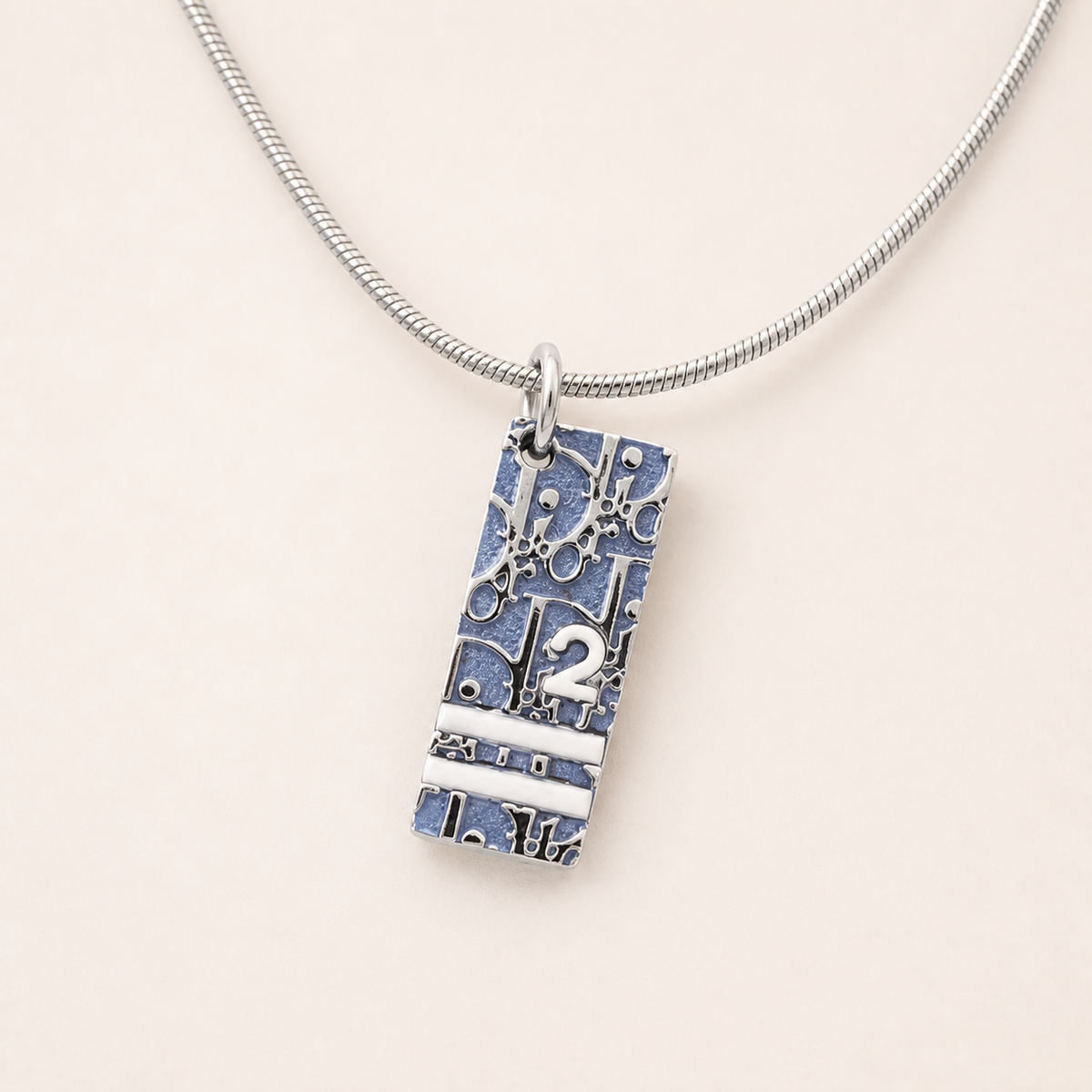 Christian Dior blue Trotter pendant necklace on silver-tone chain