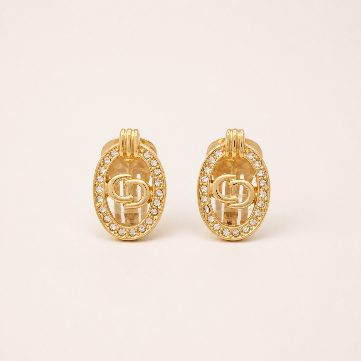 Christian Dior oval CD clip earrings with clear rhinestones