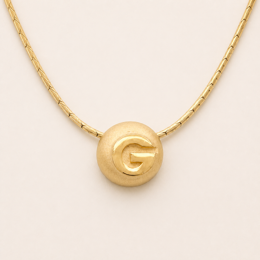 Givenchy G dome pendant necklace in satin gold-tone metal