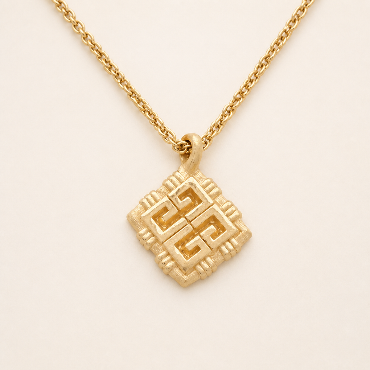 Givenchy 4G diamond-shaped pendant necklace in gold-tone metal