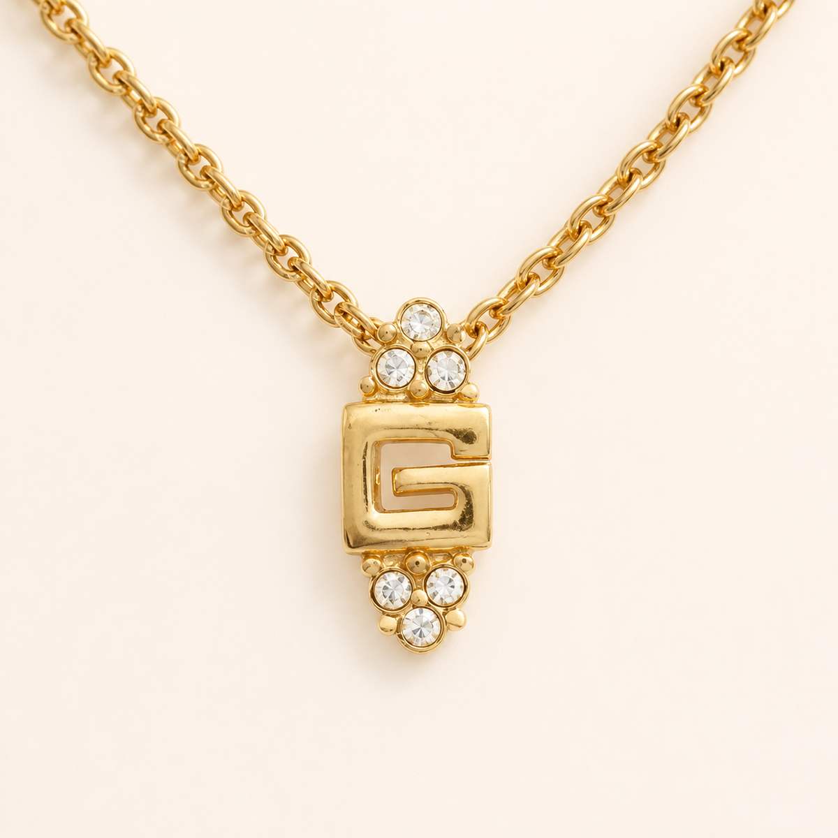 Givenchy crystal G pendant necklace in gold-tone metal