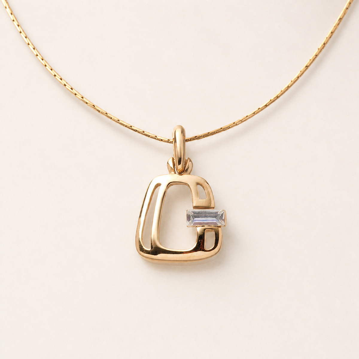 Givenchy open G crystal pendant necklace in gold-tone metal