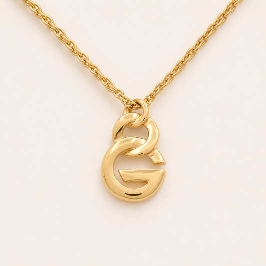Givenchy sculpted G pendant necklace in gold-tone metal