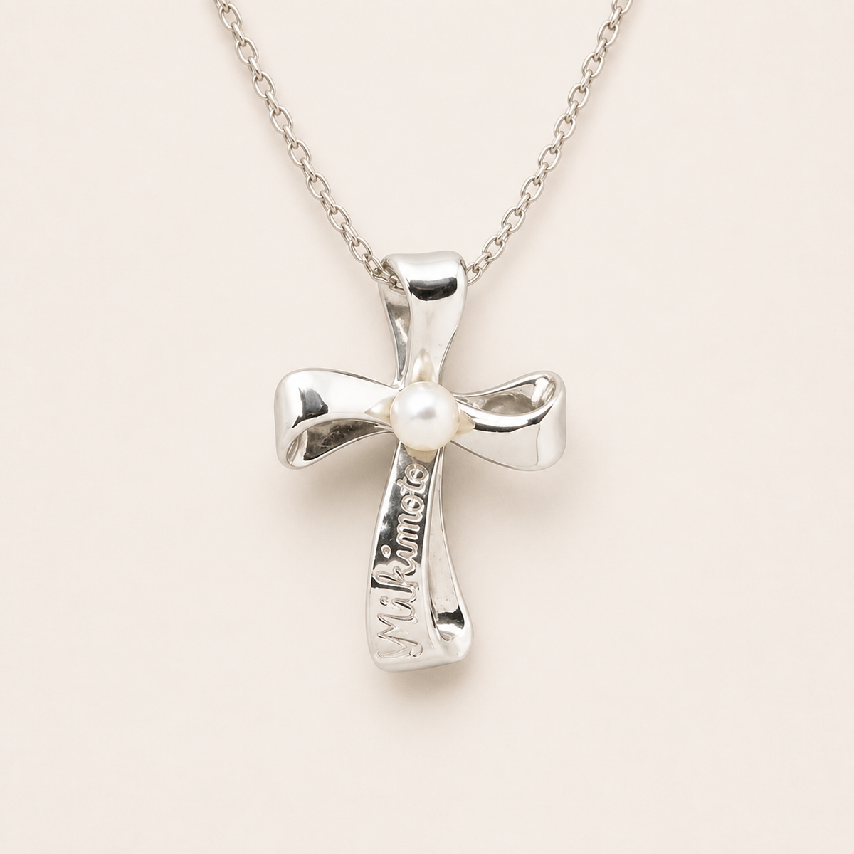 Vintage Mikimoto silver bow pendant necklace with Akoya pearl