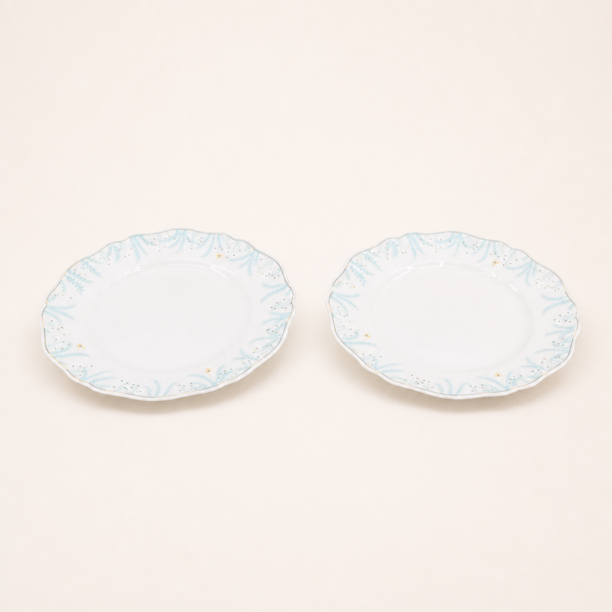 Vintage Van Cleef & Arpels set of two scalloped porcelain plates