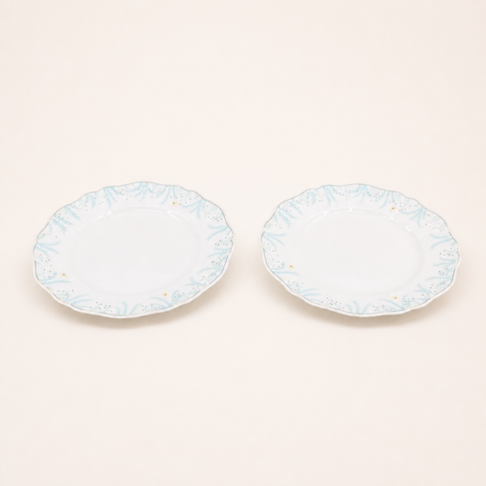Vintage Van Cleef & Arpels set of two scalloped porcelain plates
