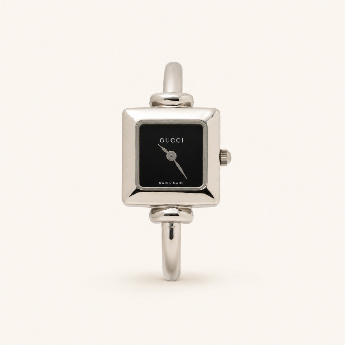 Gucci vintage 1900L silver stainless steel black square dial bangle watch, front view