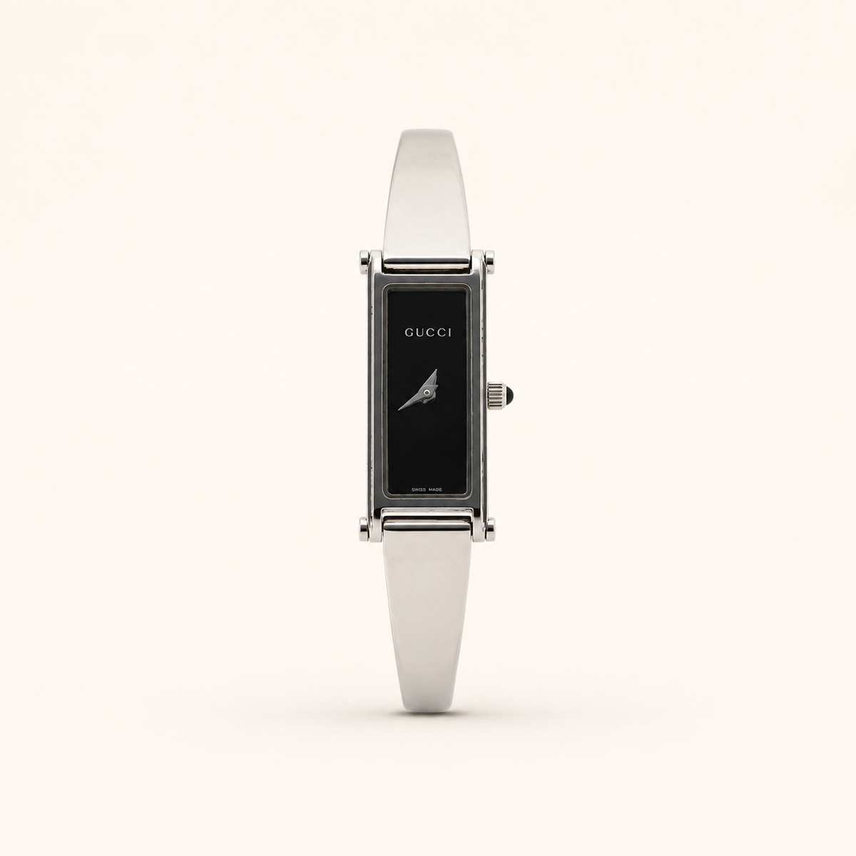 Gucci vintage 1500L silver stainless steel black dial bangle watch, front view