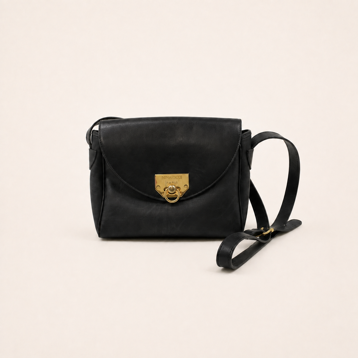 Nina Ricci Vintage Black Leather Logo Shoulder Bag – vintage designer bag front cover