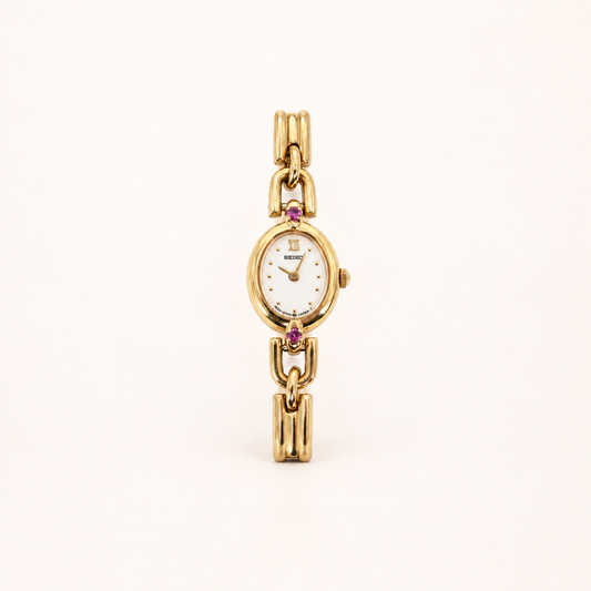 Seiko Vintage Oval Dial Amethyst Stone Bone Link Golden Watch – Diorella vintage product cover