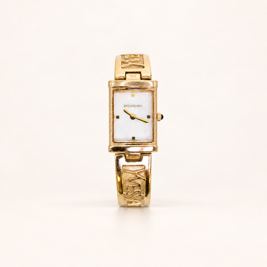 Yves Saint Laurent Vintage Rectangle Shell Pearl Face and Logo Engraved Golden Bangle Watch – Diorella vintage product cover